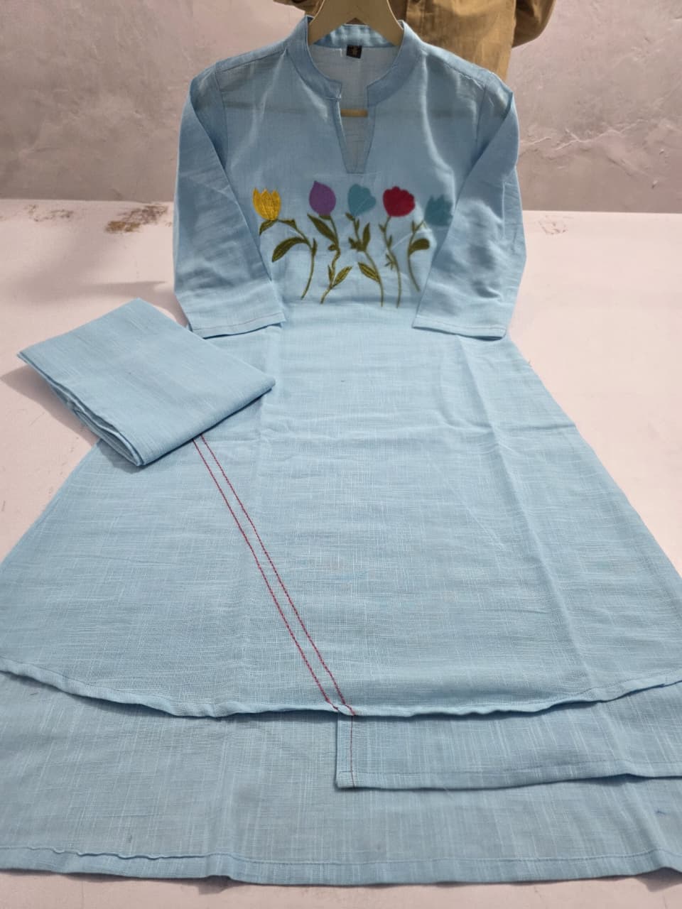 Blue Asymmetric Tulip Embroidered Kurti Trouser Set