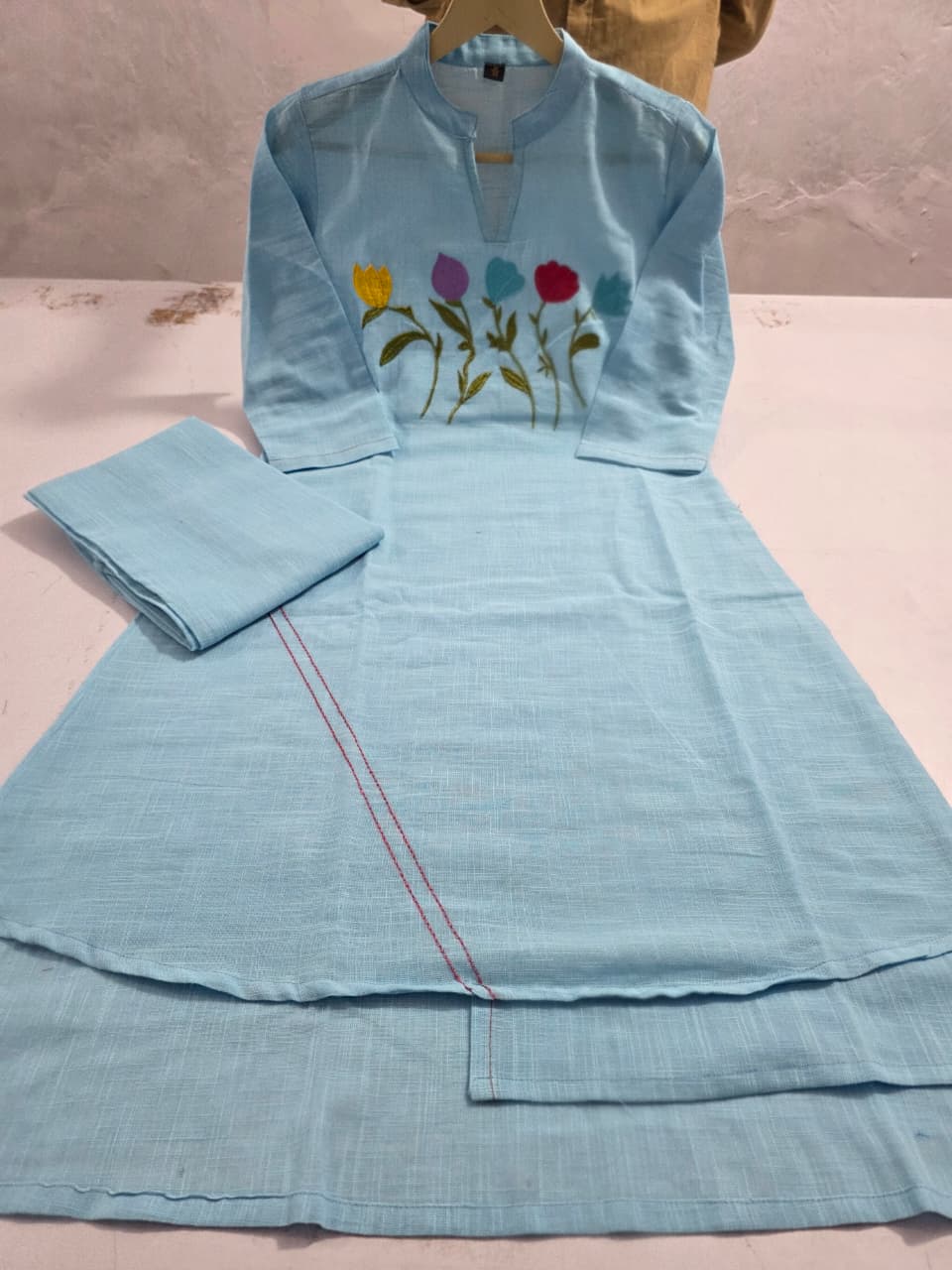 Blue Asymmetric Tulip Embroidered Kurti Trouser Set